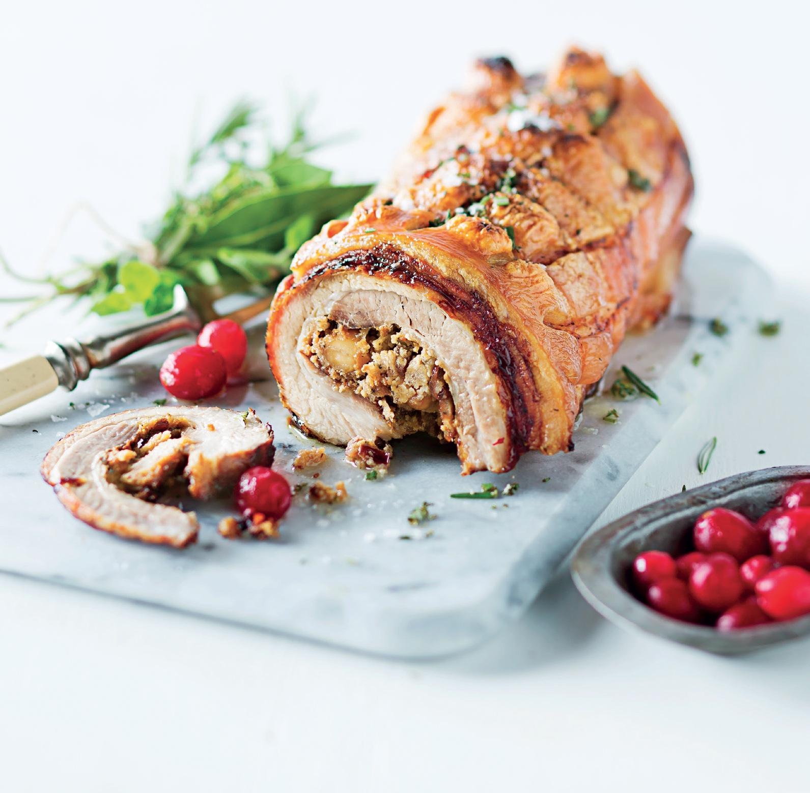 Read more about the article Pork belly with roasted hazelnut and cranberry stuffing