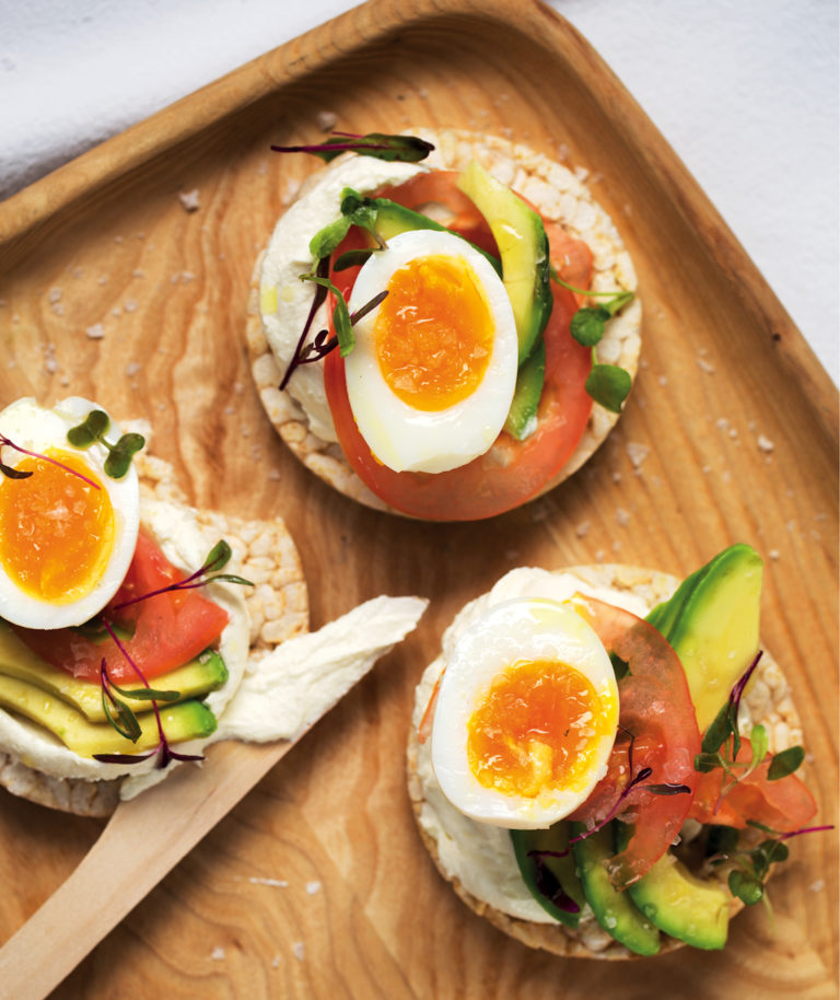 Softboiled egg, avocado and tomato ricecake stacks