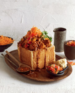 Read more about the article COOK THE COVER: Mutton curry bunny chow