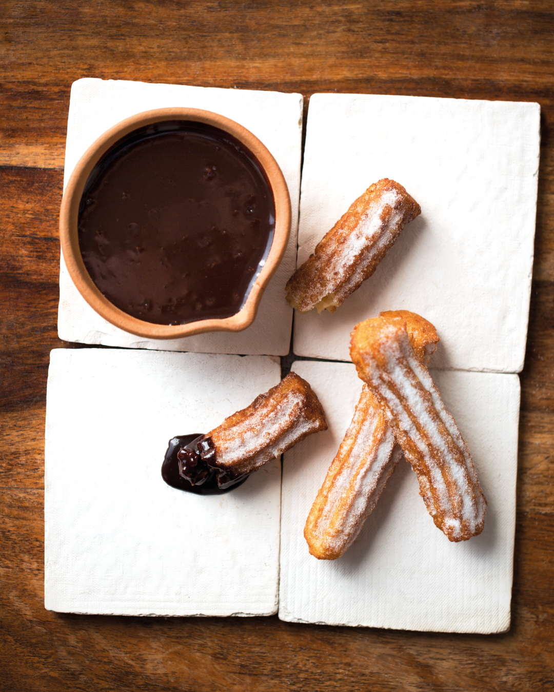You are currently viewing Decadent churros with dark chocolate sauce