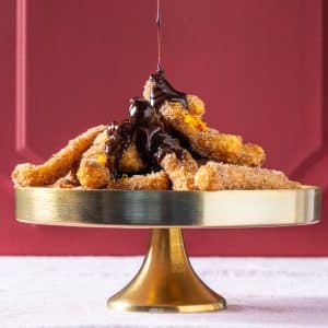 Read more about the article Churros with citrus, chilli and chocolate sauce